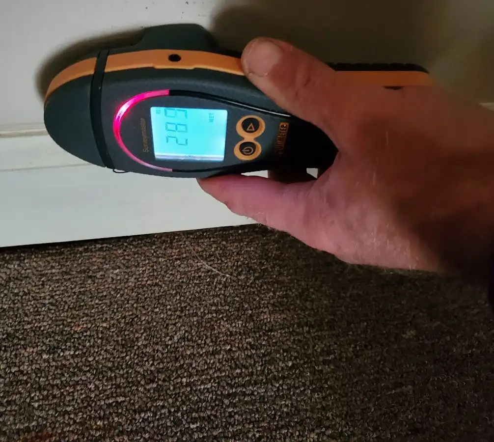 Moisture detection at baseboard during Burst Pipe Cleanup in Fort Riley